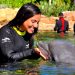 Gabriela Rocha Nadando com os Golfinhos – Discovery Cove